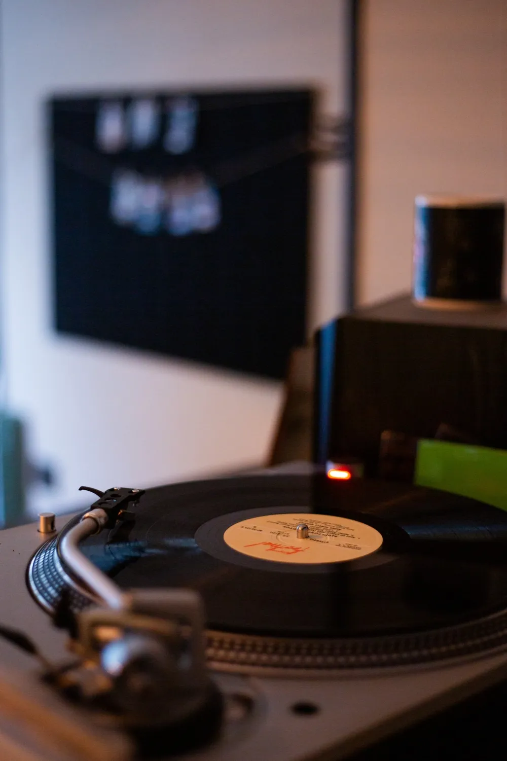 Record playing on the turntable at Licensed Coffee